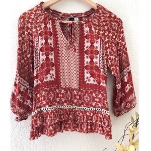 Francesca’s Burnt Orange and White Pattern Blouse